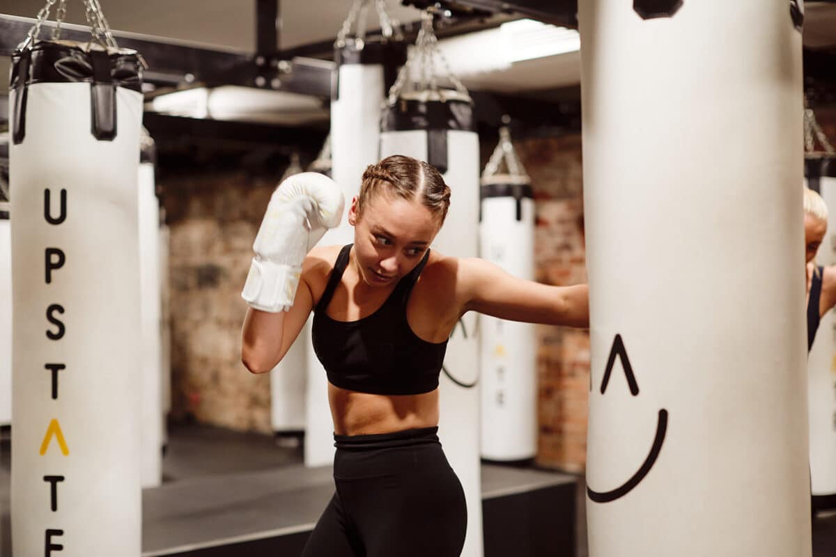 Upstate fitness instructor Renee working out in the unique boxing room at Upstate