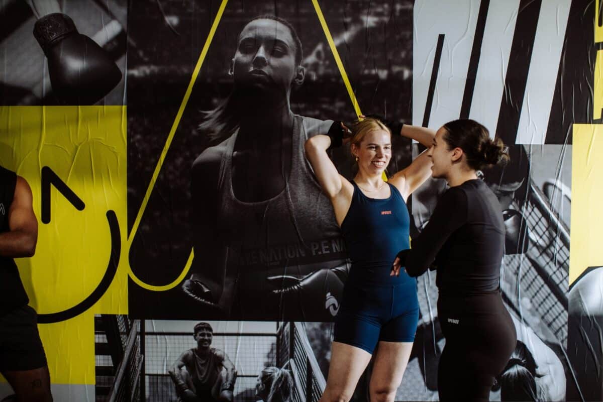 2 girls in a boxing class, pre-class in the Fitzroy studio.