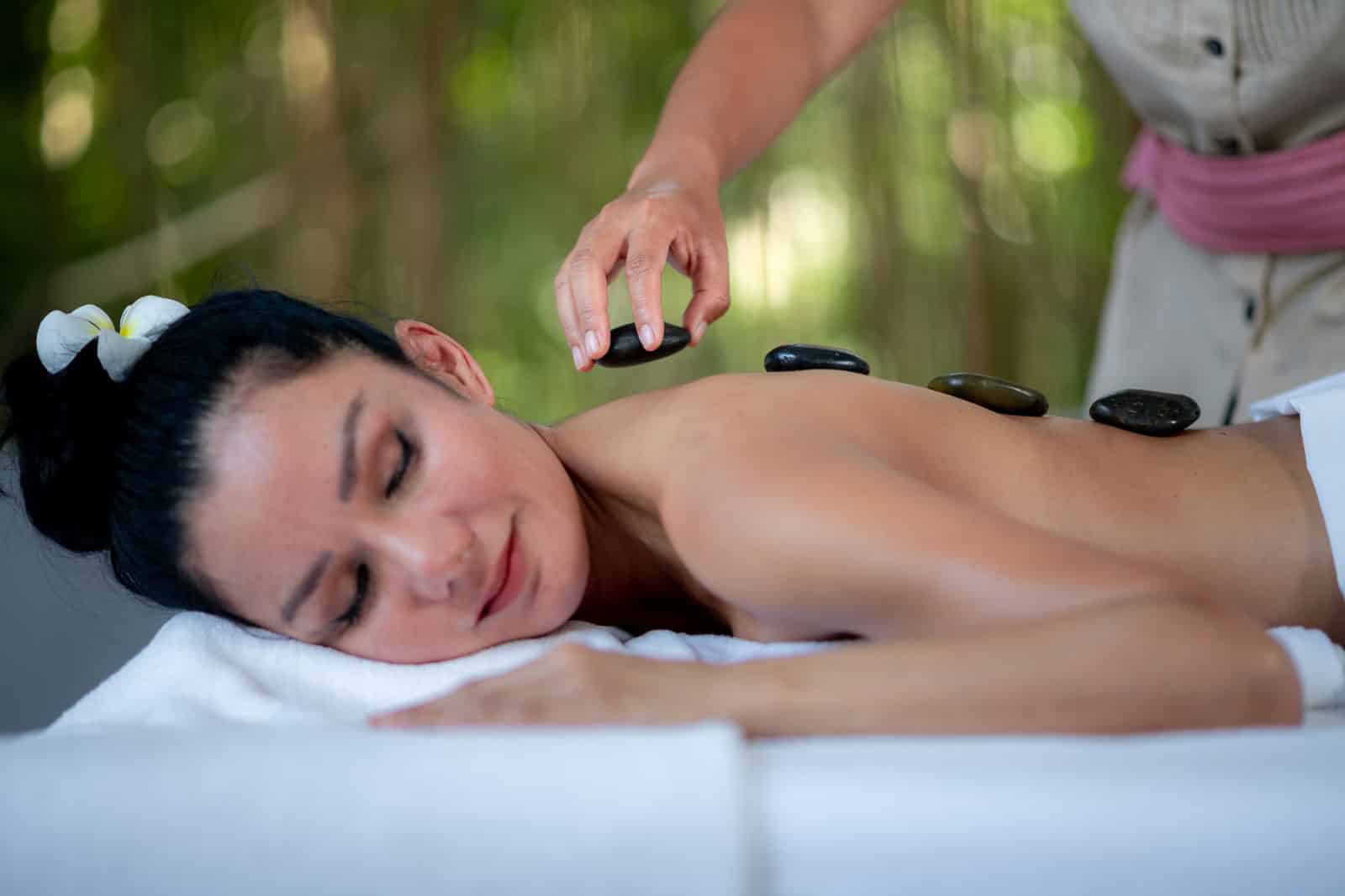 Lady enjoying a Spa treatment in Thailand resort